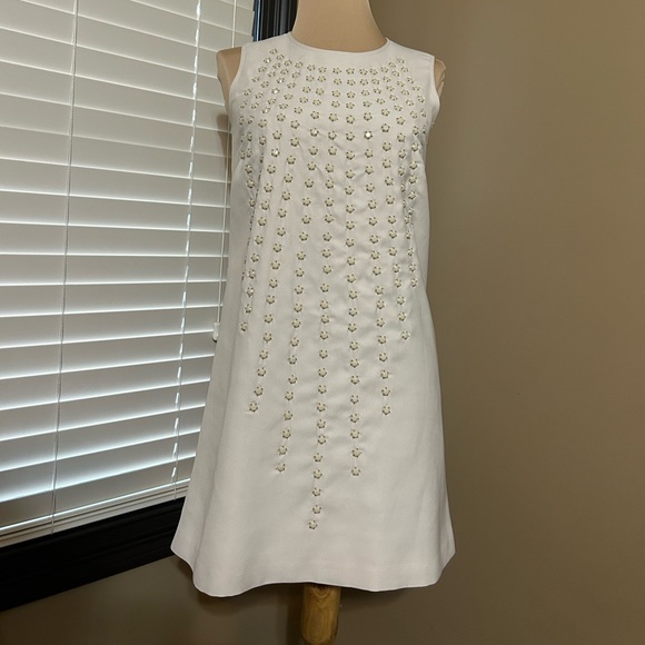 Chic Sleeveless White Cram Dress with Embellishments - Picture 2 of 5
